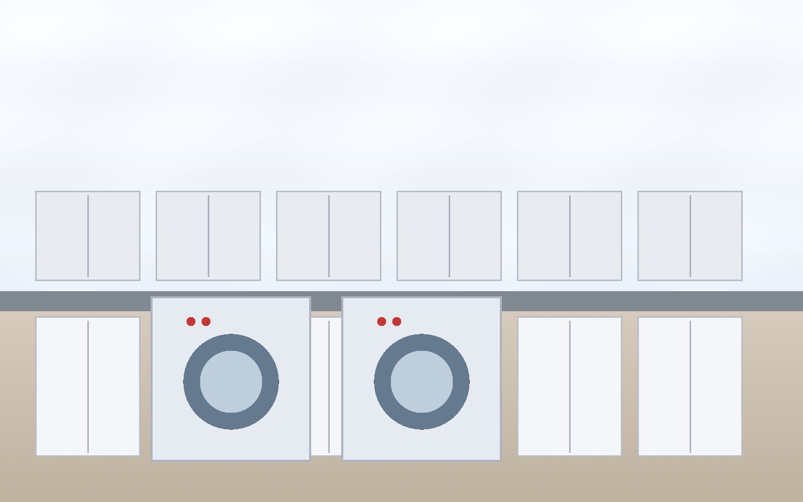 Technician servicing front-loading washer and dryer in Atlanta property